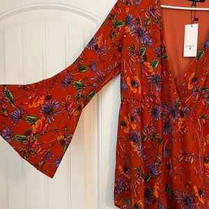 Orange floral romper with flowy sleeves NTW